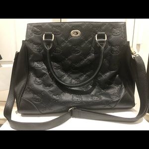 Large black Hello Kitty Embossed Purse $35